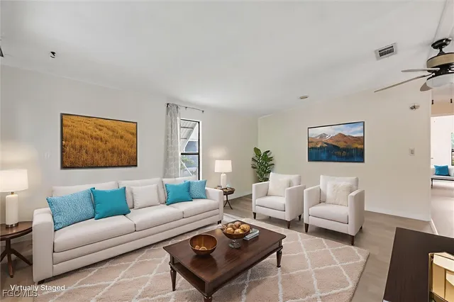 a view of a livingroom with wooden floor
