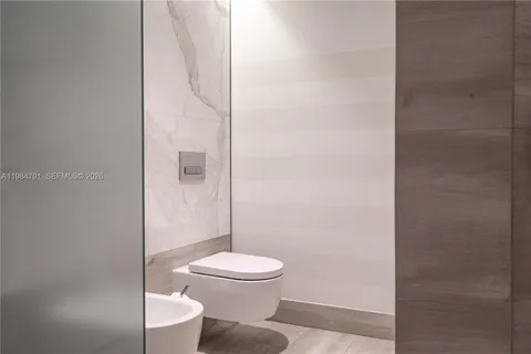 a bathroom with a toilet