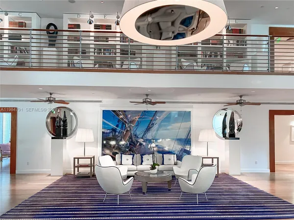 a kitchen with a table and chairs