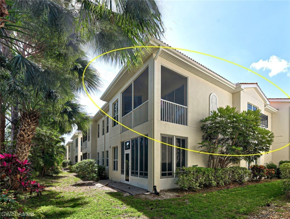 604 Ravinia Circle, Unit 604 Venice, FL 34292 - Photo 2 of 37 a view of a house with a yard