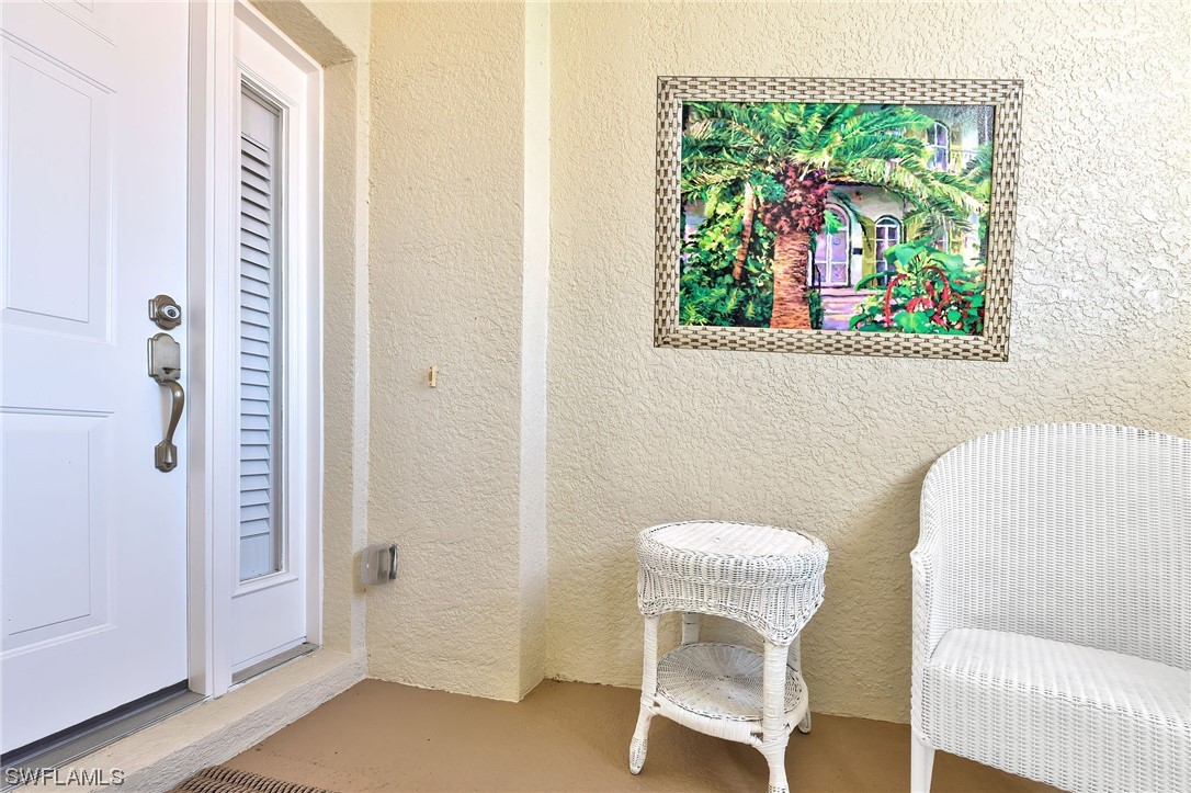 604 Ravinia Circle, Unit 604 Venice, FL 34292 - Photo 7 of 37 a bathroom with a sink and a mirror