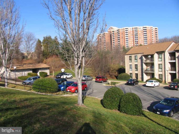 6137 Edsall Road, Unit J Alexandria, VA 22304 - Photo 13 of 13 a front view of a building with garden