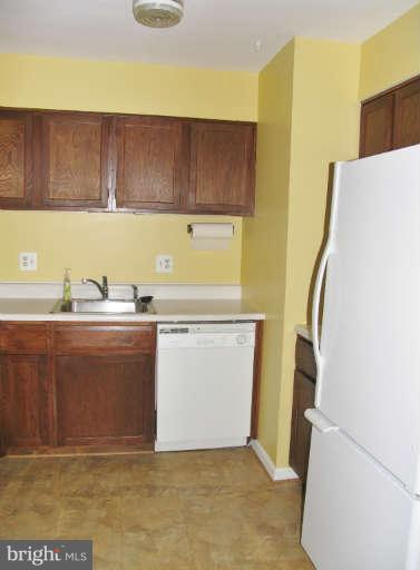 6137 Edsall Road, Unit J Alexandria, VA 22304 - Photo 6 of 13 a view of kitchen with wooden floor