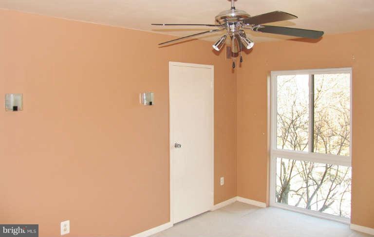 6137 Edsall Road, Unit J Alexandria, VA 22304 - Photo 8 of 13 a view of entryway with a chandelier fan