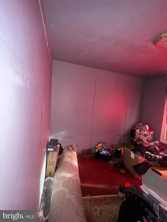 a bathroom with a toilet and shower