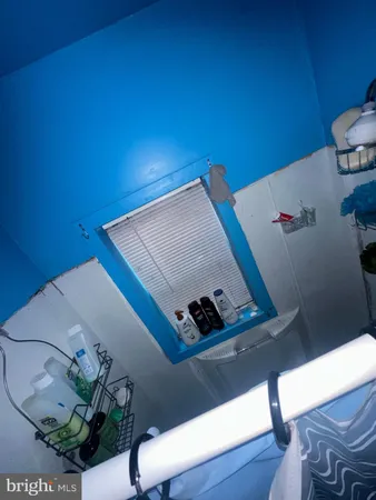 a room with furniture and a window