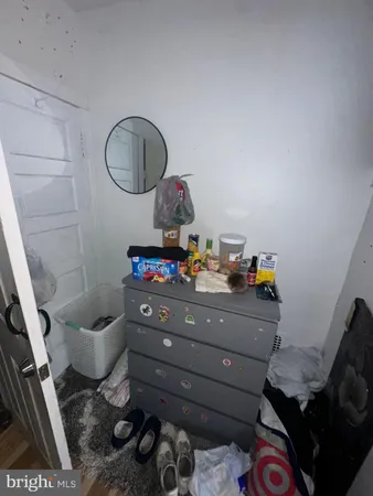 a kitchen with a stove and a refrigerator