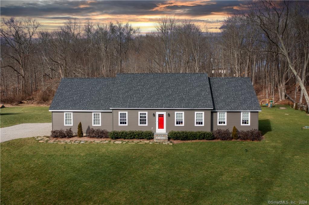 14 Brown Road Brooklyn, CT 06234 - Photo 1 of 1 a front view of house with yard and green space