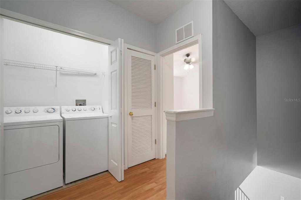 1231 Charlesworth Drive Wesley Chapel, FL 33543 - Photo 22 of 41 a utility room with closet dryer and washer