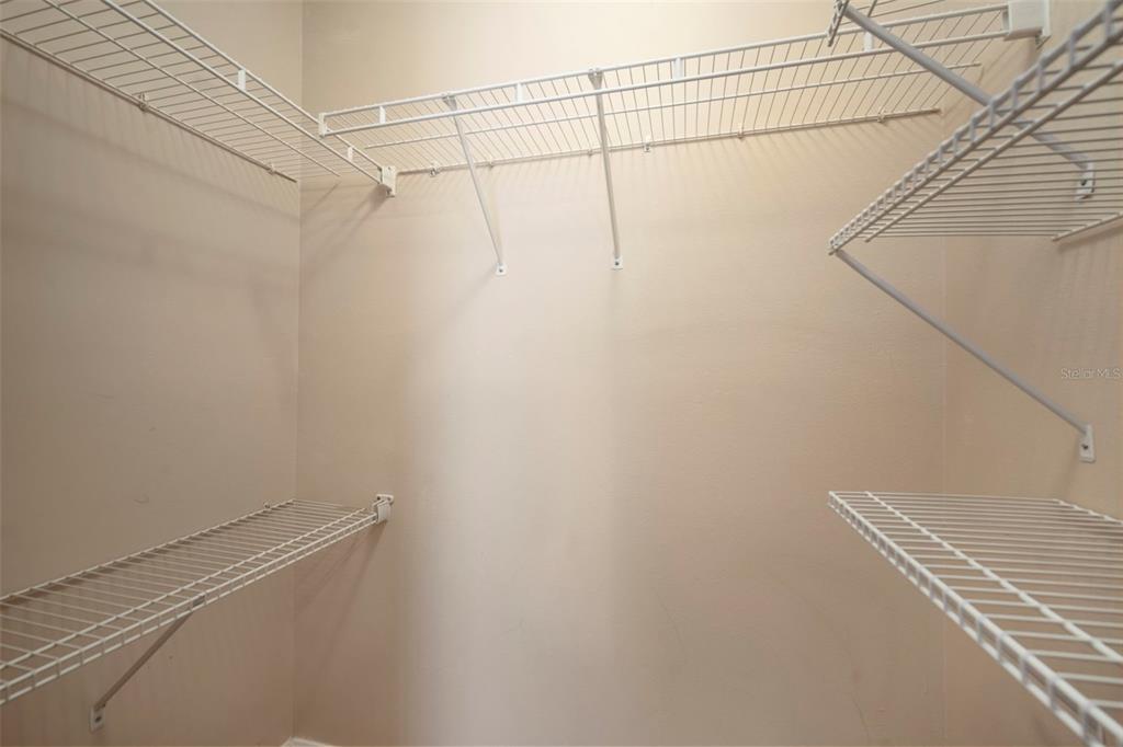 1231 Charlesworth Drive Wesley Chapel, FL 33543 - Photo 32 of 41 a view of a room with racks on the wall