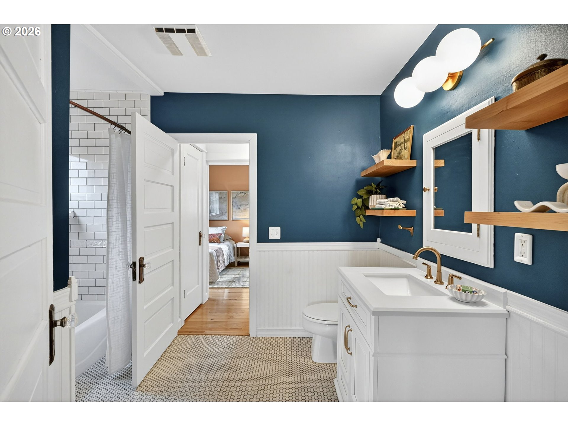 6128 Southeast Reedway Street Portland, OR 97206 - Photo 21 of 40 a living room with furniture and a table