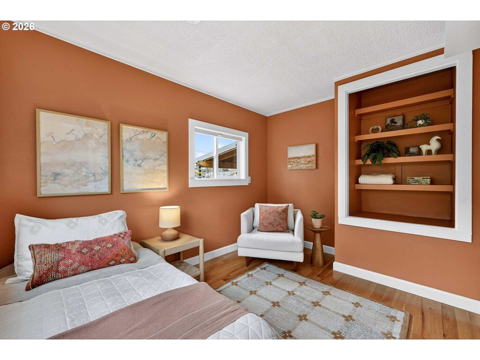 6128 Southeast Reedway Street Portland, OR 97206 - Photo 26 of 40 a bedroom with furniture and a window