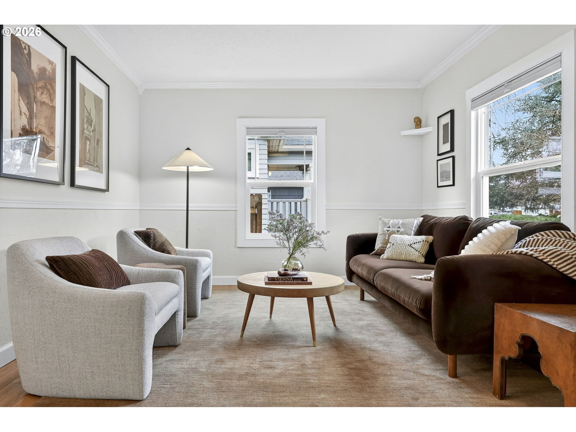 6128 Southeast Reedway Street Portland, OR 97206 - Photo 8 of 40 a living room with furniture and a large window