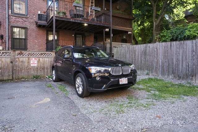 a car parked in front of a house
