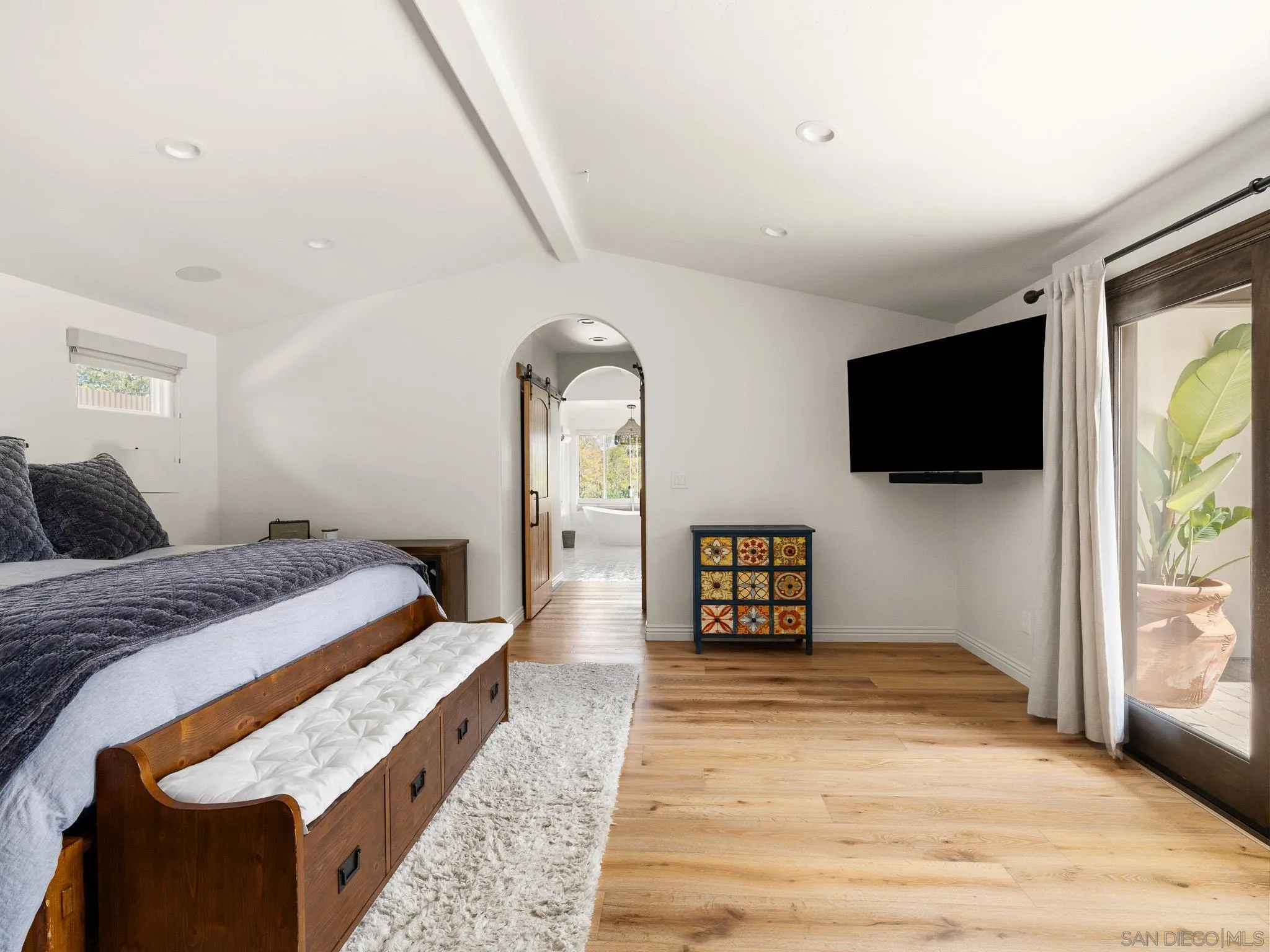 331 Glencrest Drive Solana Beach, CA 92075 - Photo 13 of 43 a bedroom with a bed and a flat screen tv