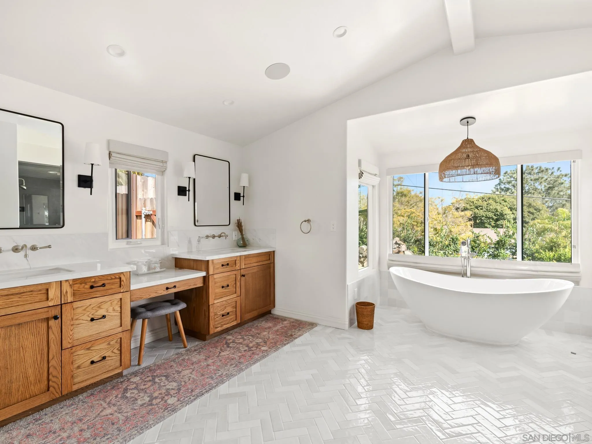 331 Glencrest Drive Solana Beach, CA 92075 - Photo 16 of 43 a large bathroom with a large tub and sink