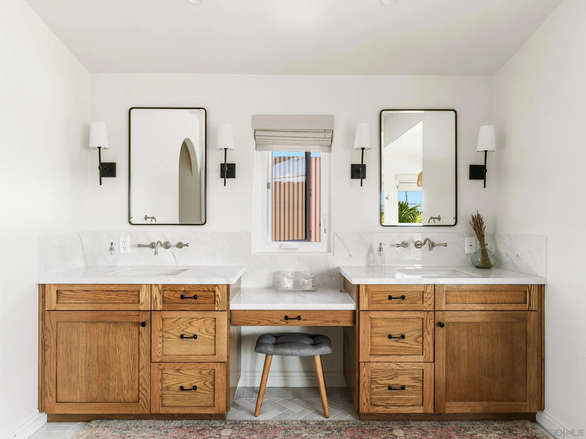 331 Glencrest Drive Solana Beach, CA 92075 - Photo 18 of 43 a bathroom with a granite countertop sink vanity and mirror