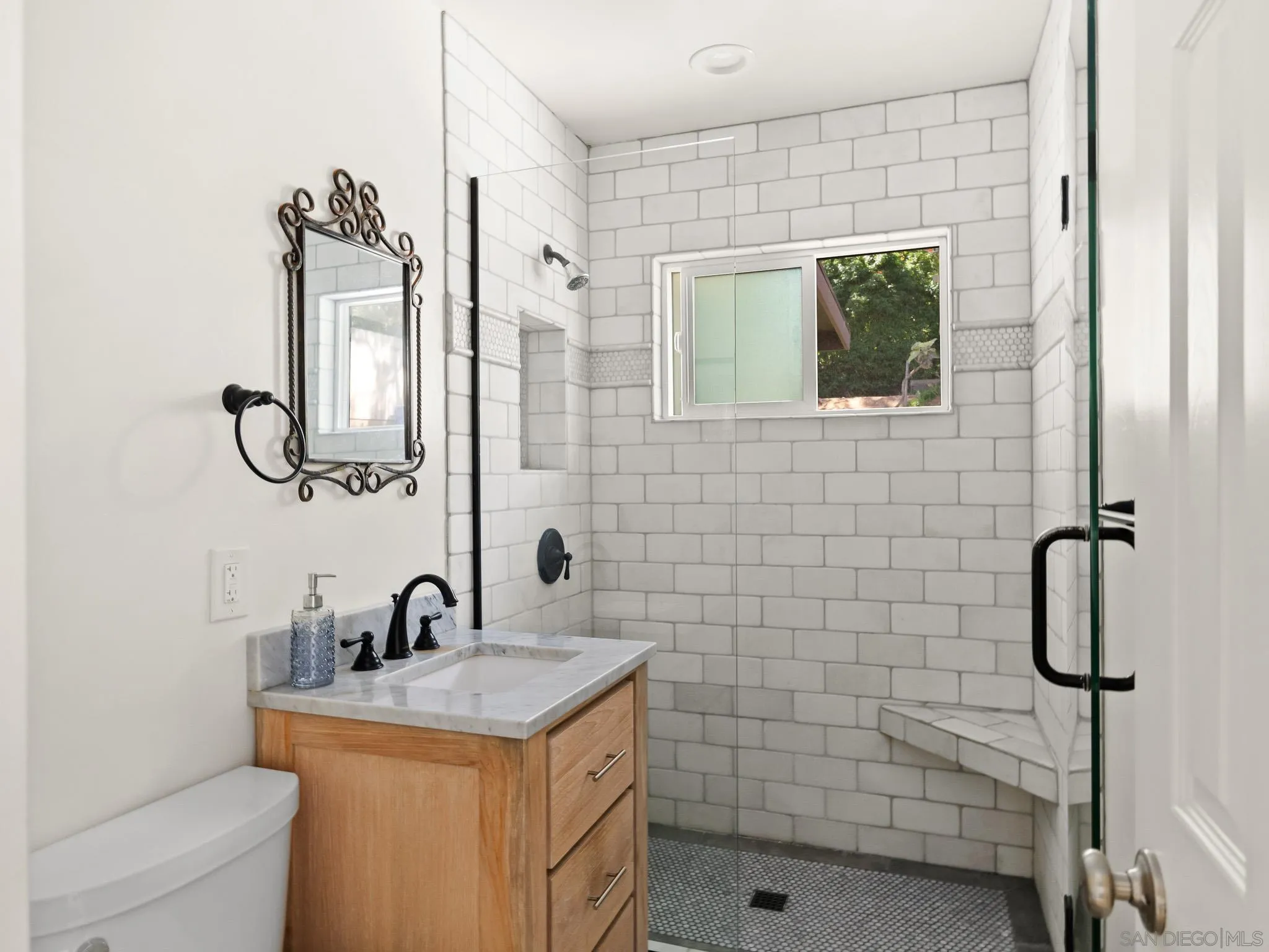 331 Glencrest Drive Solana Beach, CA 92075 - Photo 20 of 43 a bathroom with a granite countertop sink a mirror and shower