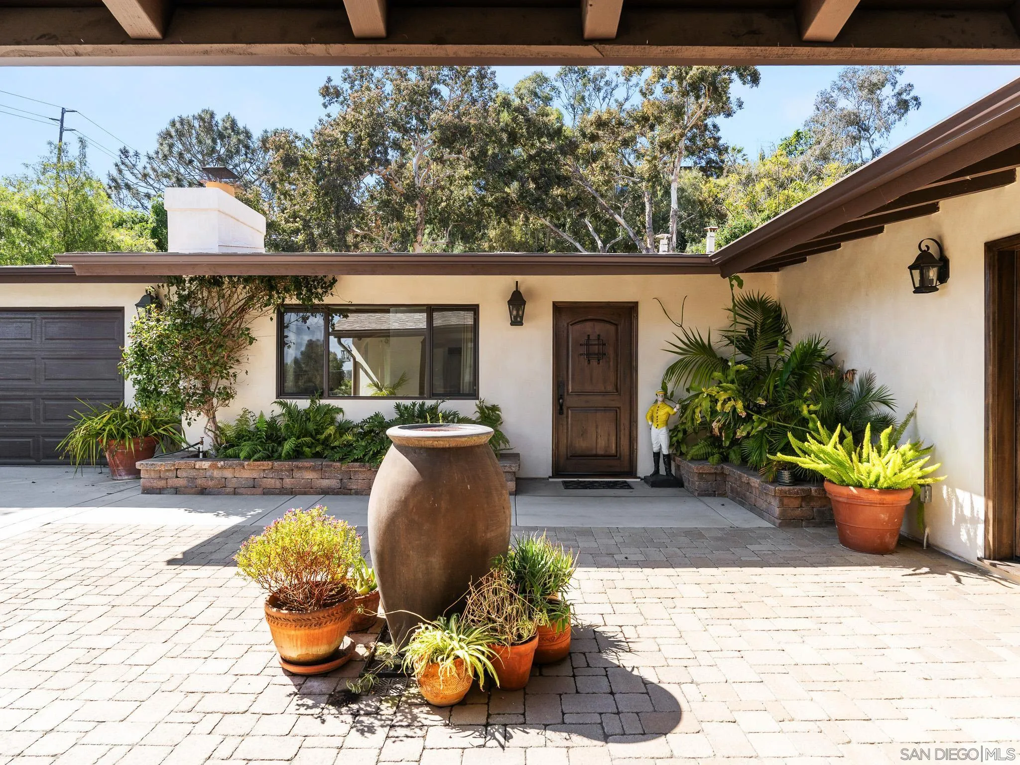 331 Glencrest Drive Solana Beach, CA 92075 - Photo 2 of 43 a view of a porch with furniture and garden