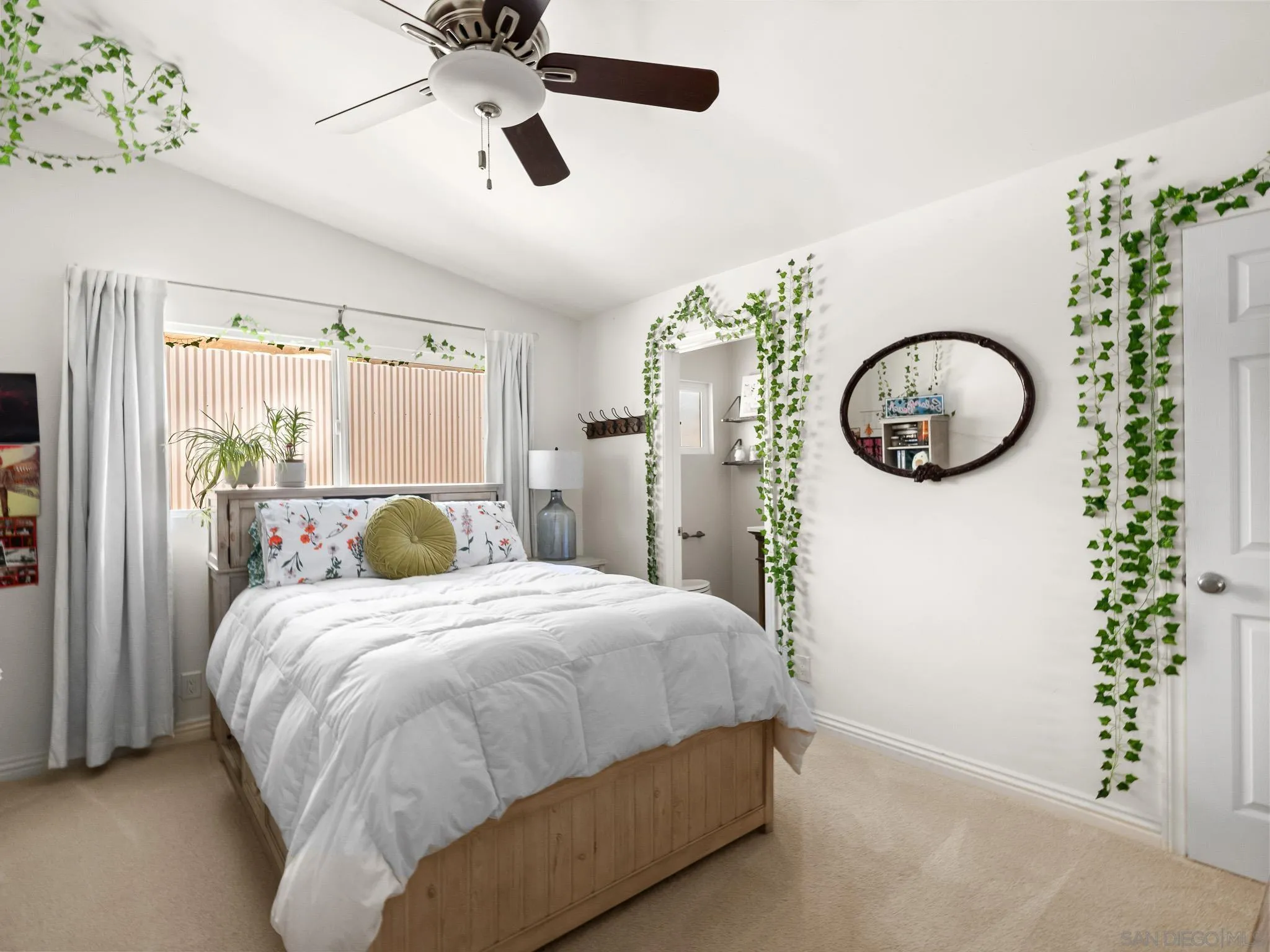 331 Glencrest Drive Solana Beach, CA 92075 - Photo 21 of 43 a bedroom with a bed mirror and a large mirror