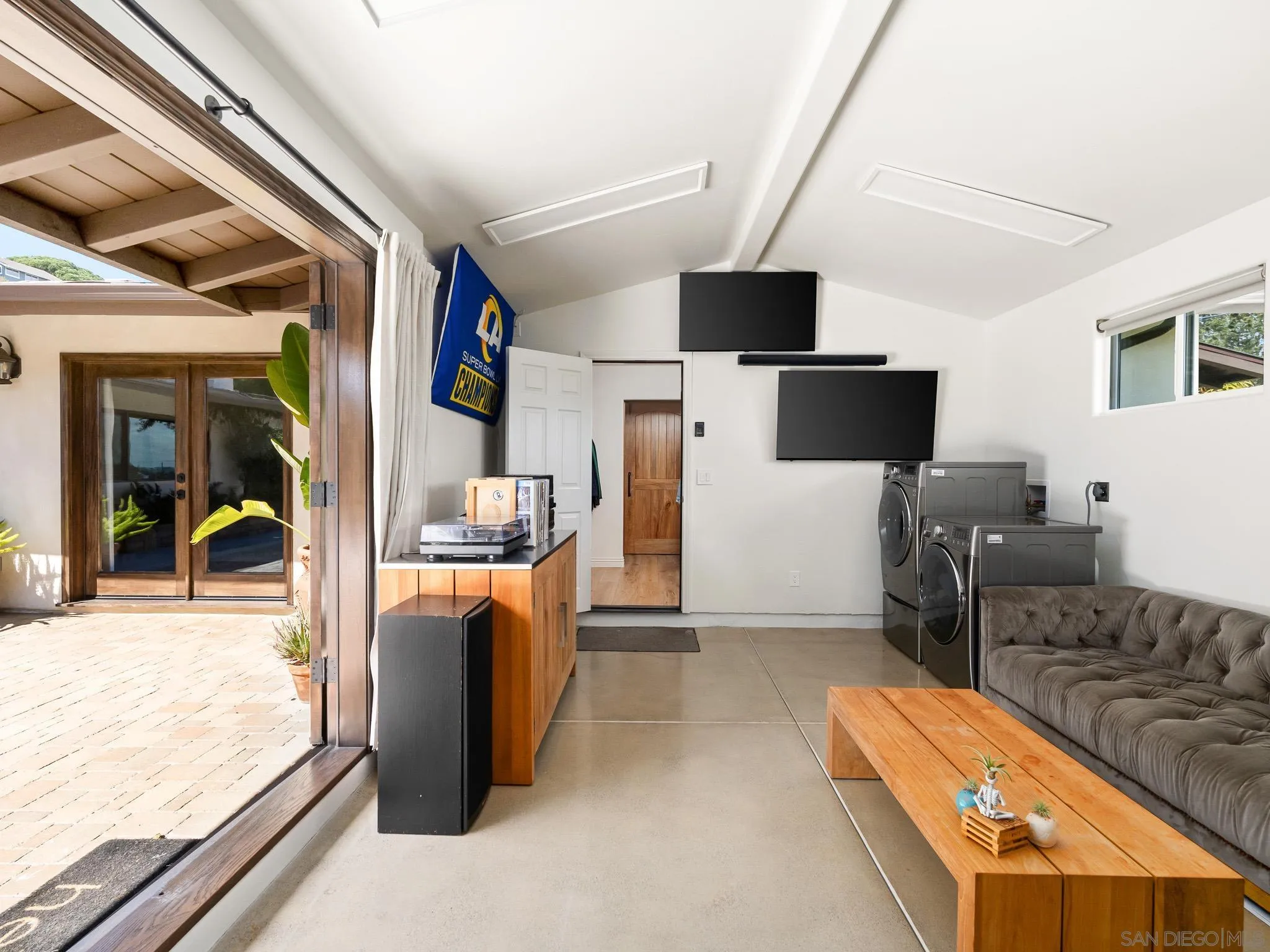 331 Glencrest Drive Solana Beach, CA 92075 - Photo 23 of 43 a living room with furniture and a flat screen tv