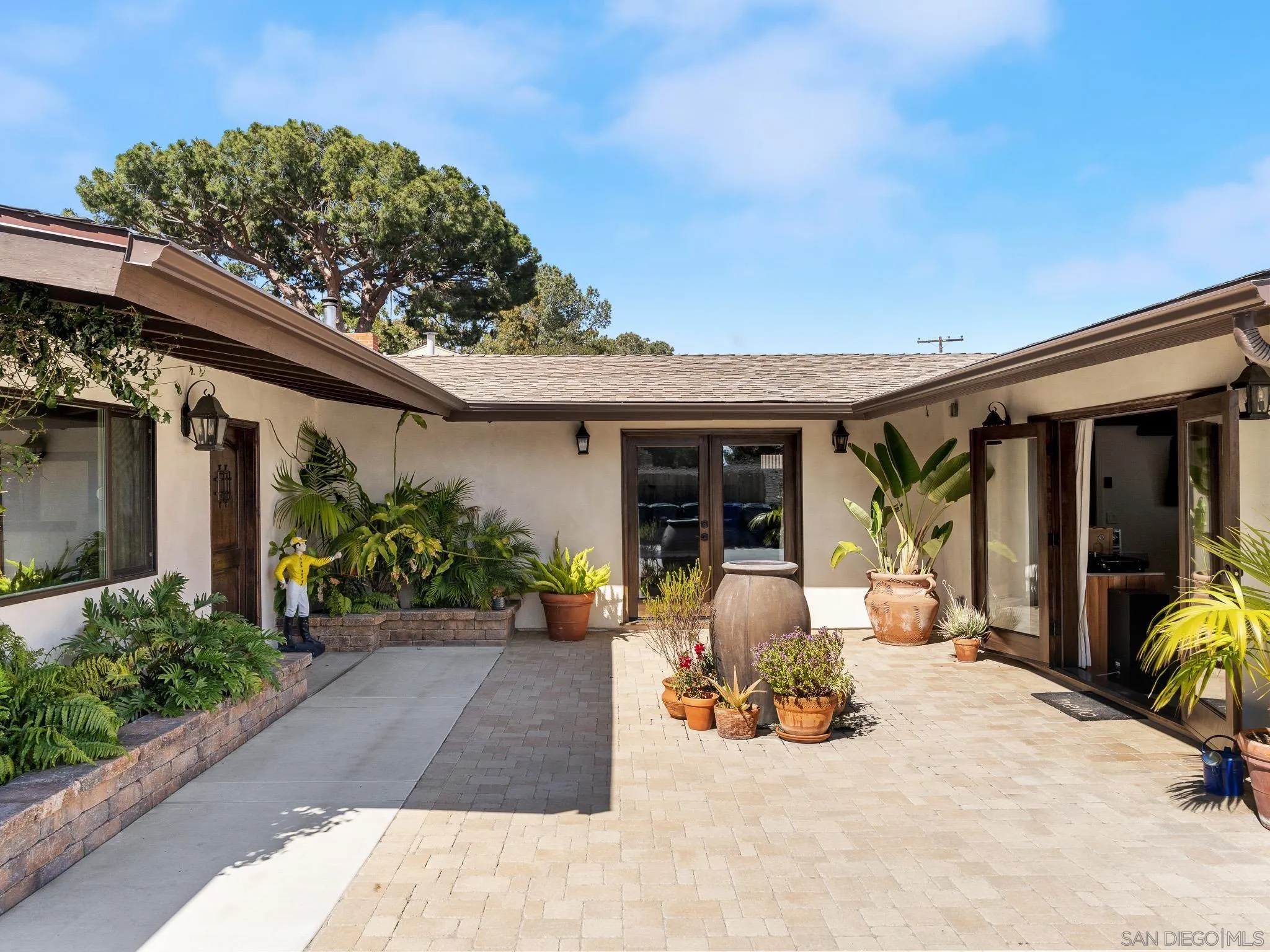 331 Glencrest Drive Solana Beach, CA 92075 - Photo 26 of 43 a view of a chair and tables in patio of the house