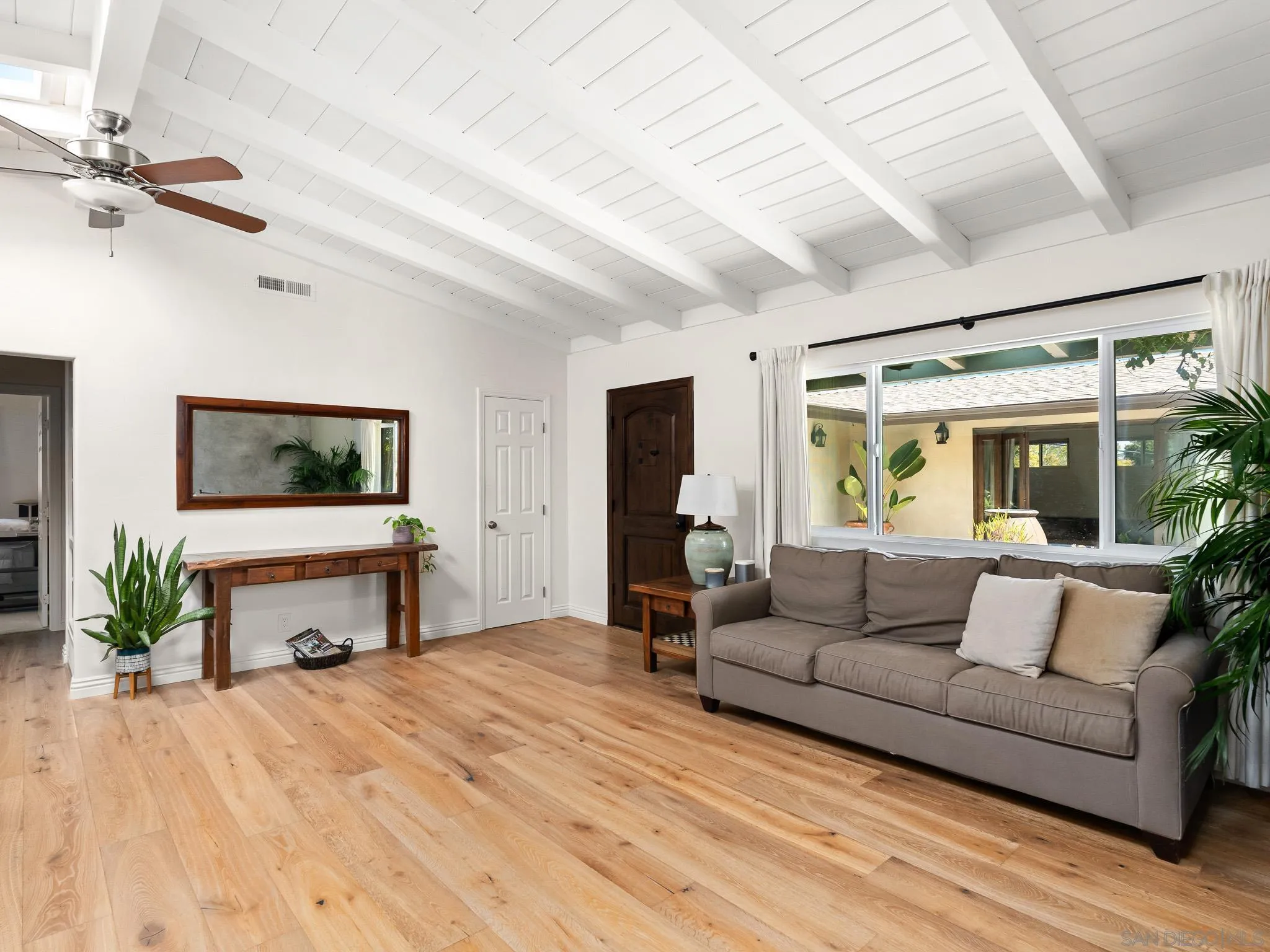 331 Glencrest Drive Solana Beach, CA 92075 - Photo 3 of 43 a living room with furniture and a flat screen tv