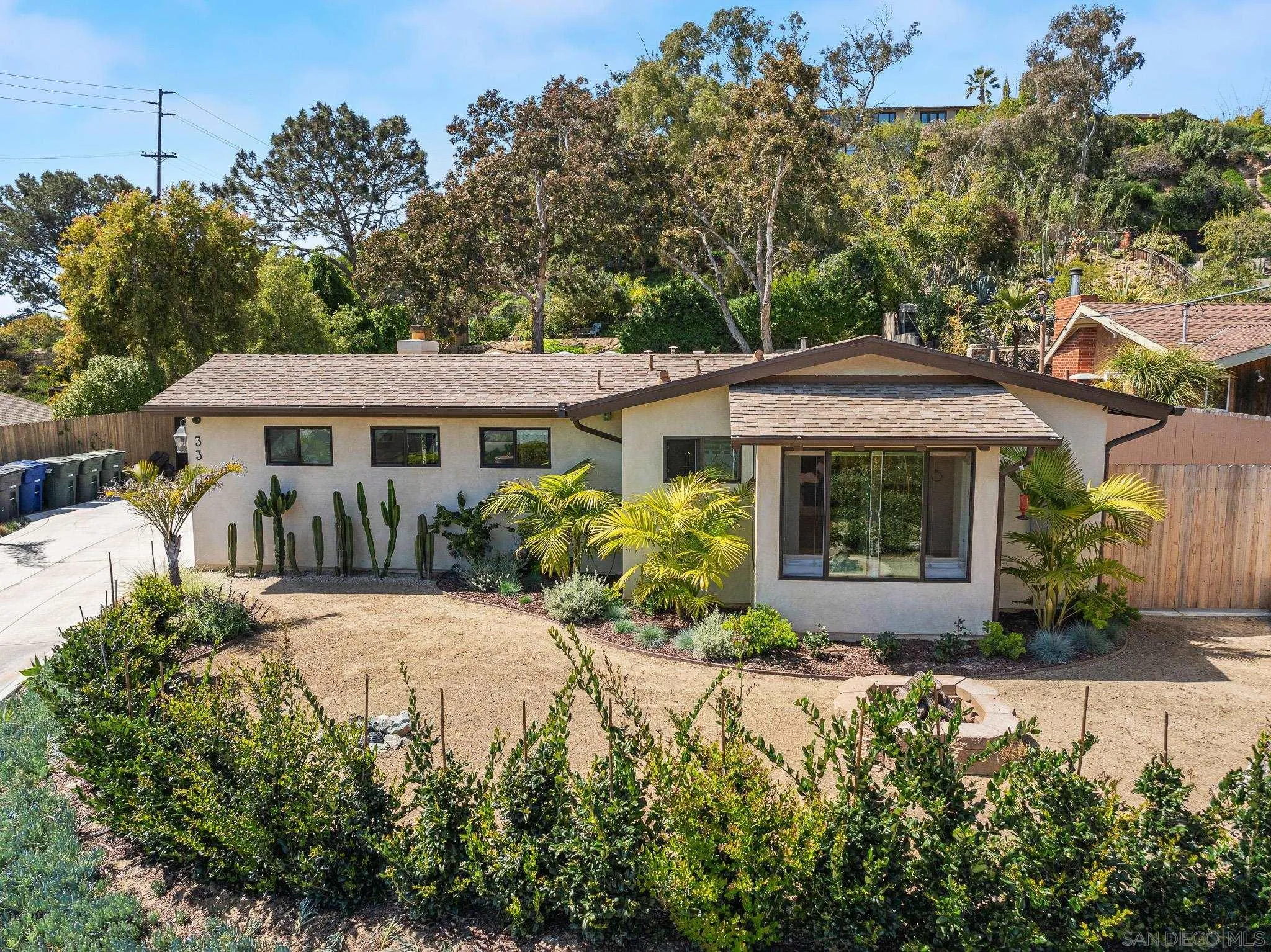 331 Glencrest Drive Solana Beach, CA 92075 - Photo 38 of 43 a front view of a house with a yard