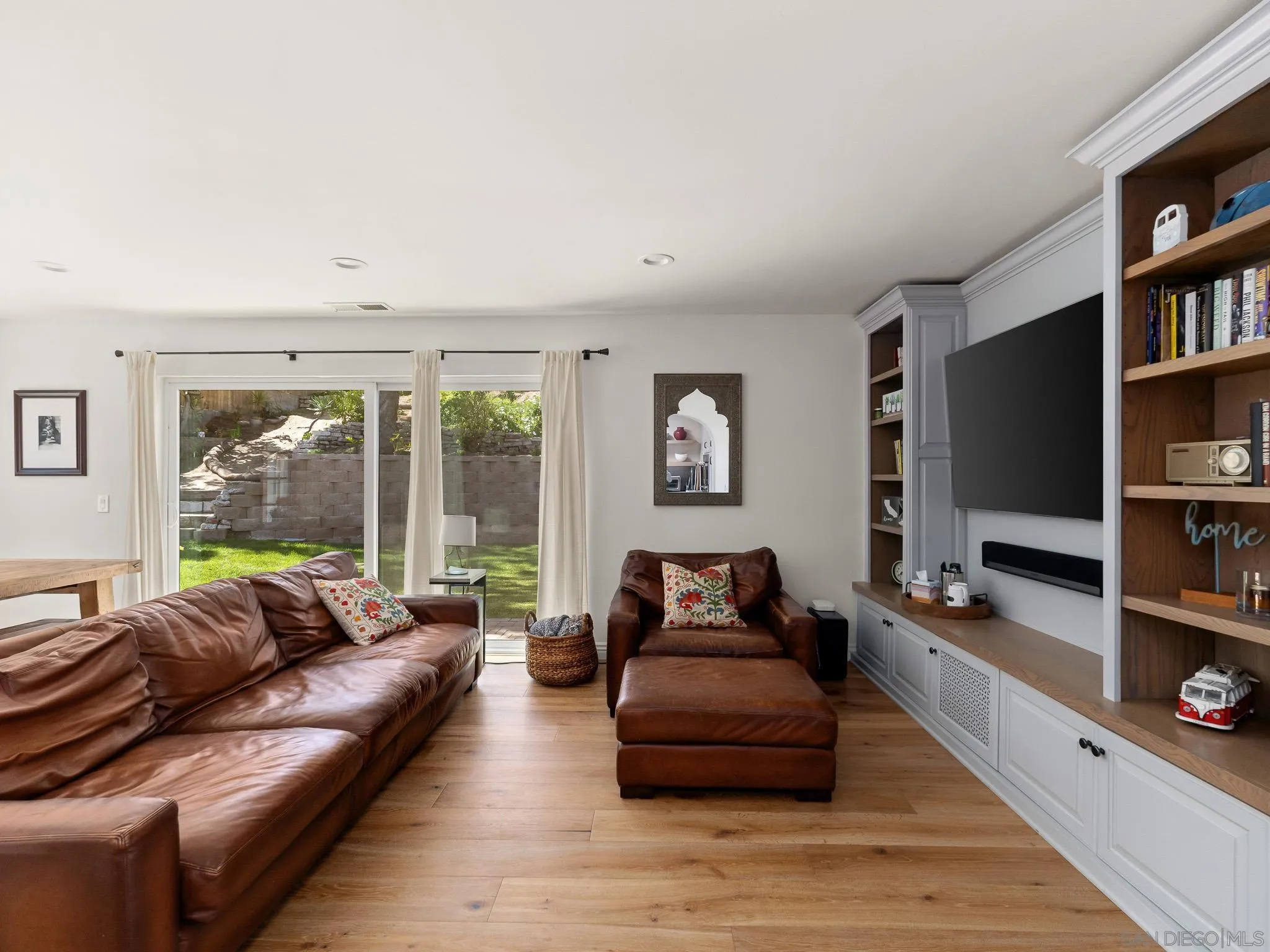331 Glencrest Drive Solana Beach, CA 92075 - Photo 8 of 43 a living room with furniture and a flat screen tv