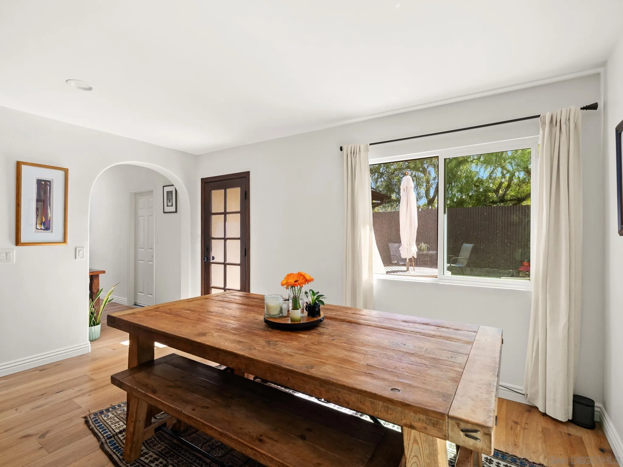 331 Glencrest Drive Solana Beach, CA 92075 - Photo 10 of 43 a view of a dining room with furniture window and wooden floor