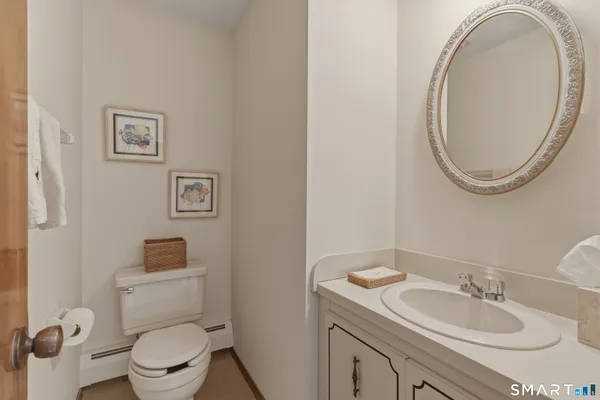 a bedroom with a large bed and a couch