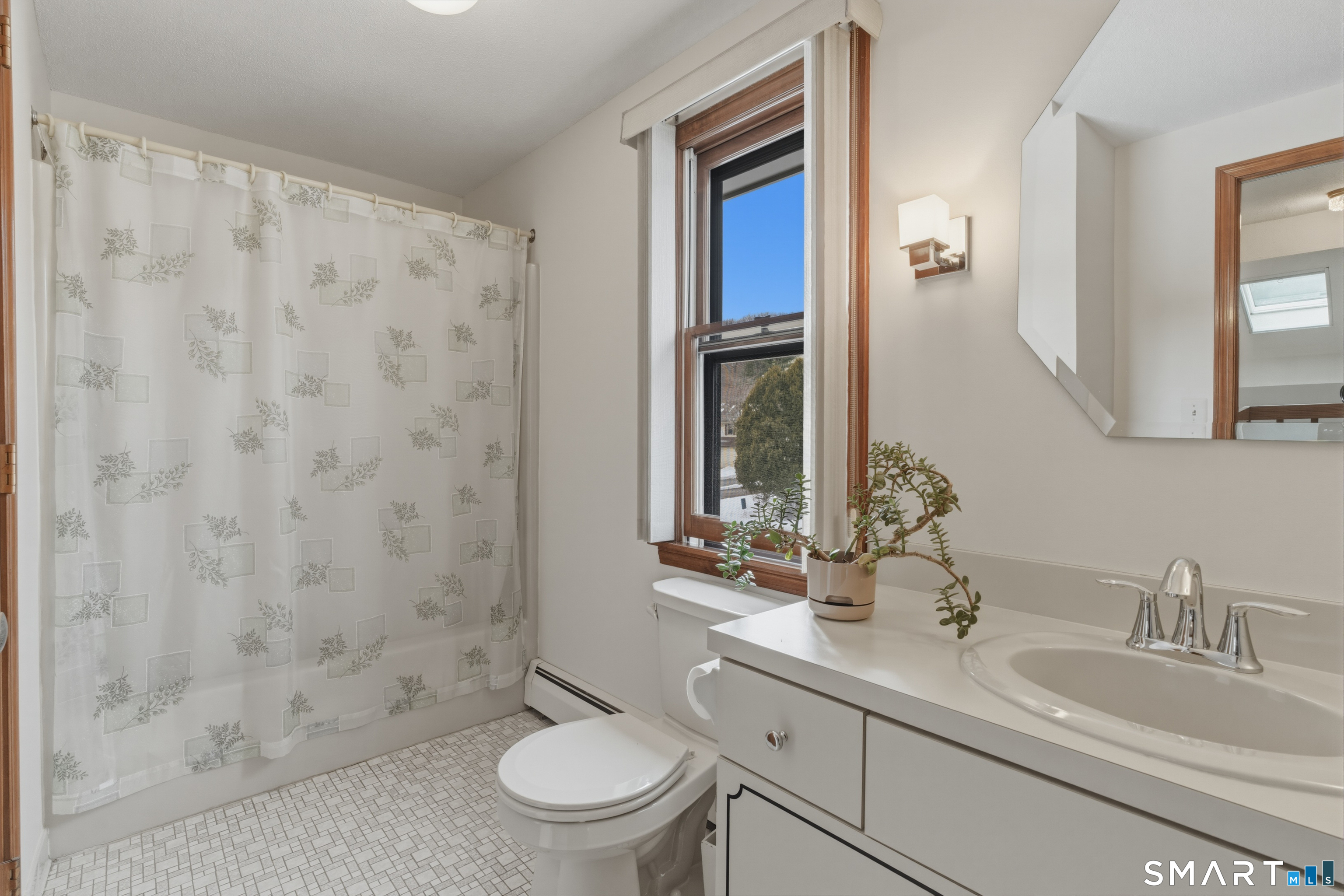 15 Potter Crossing, Unit 15 Wethersfield, CT 06109 - Photo 18 of 21 a bathroom with a granite countertop sink toilet and shower