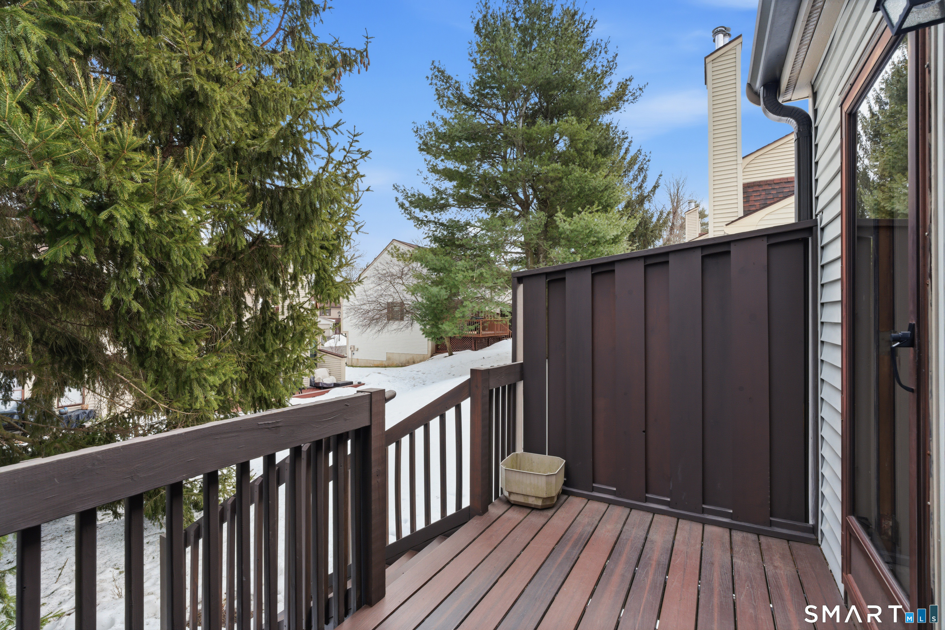 15 Potter Crossing, Unit 15 Wethersfield, CT 06109 - Photo 19 of 21 a balcony with wooden floor and outdoor space