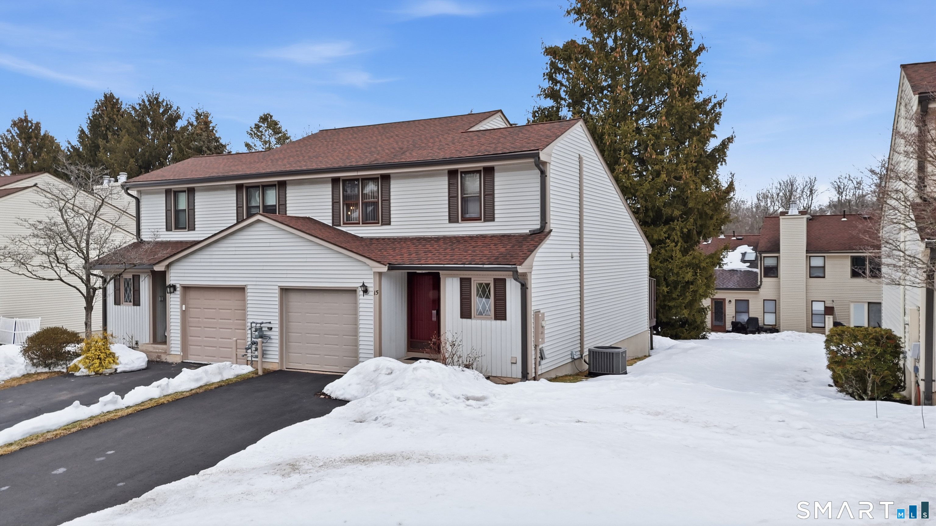 15 Potter Crossing, Unit 15 Wethersfield, CT 06109 - Photo 2 of 21 a front view of a house with a yard