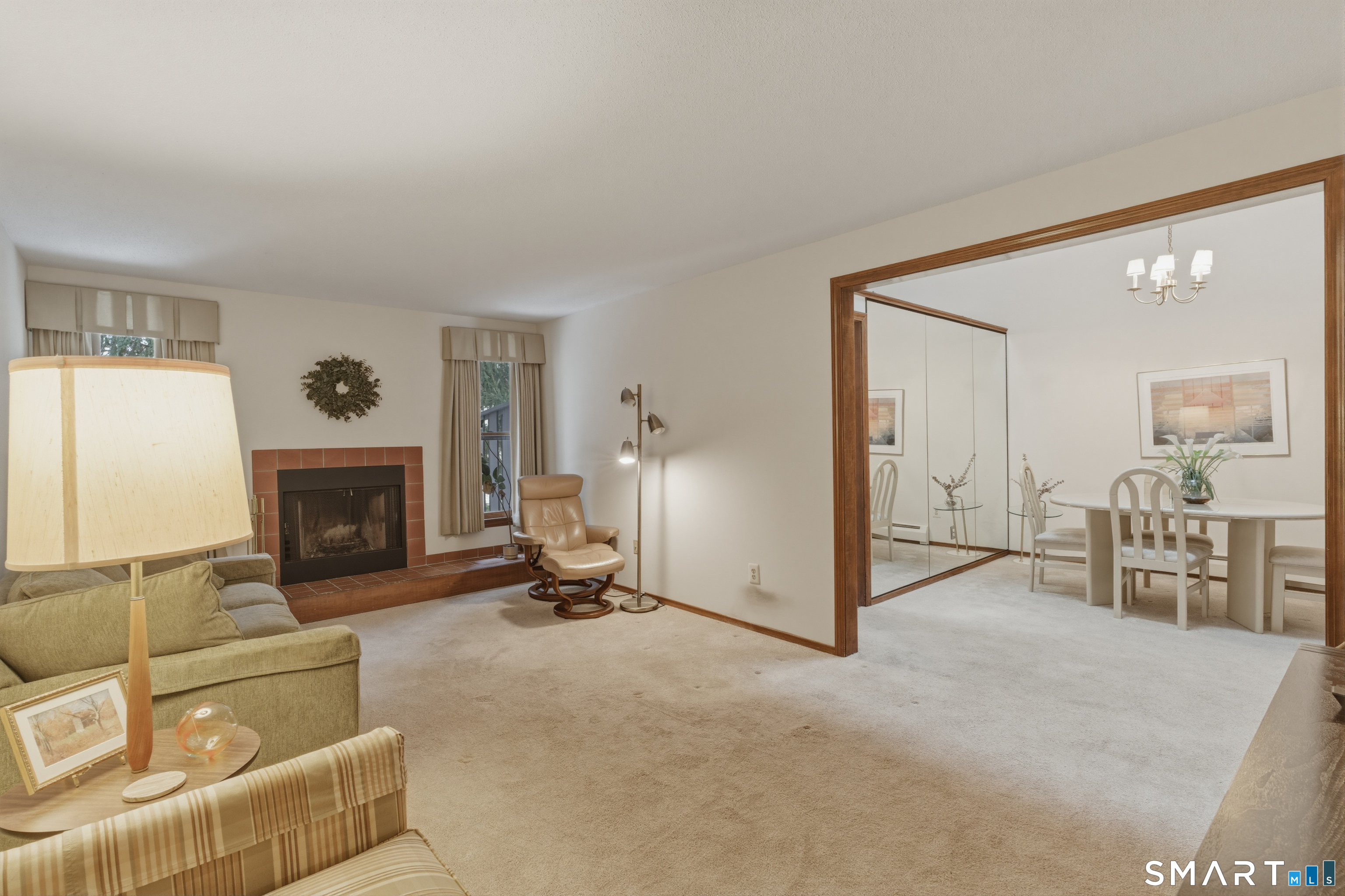 15 Potter Crossing, Unit 15 Wethersfield, CT 06109 - Photo 8 of 21 a view of a livingroom with furniture and a fireplace