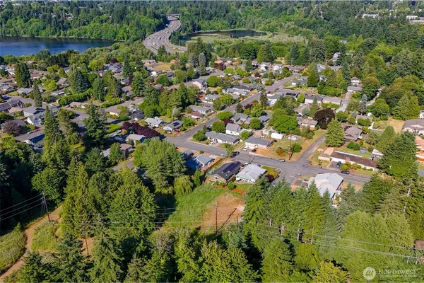 a aerial view of a house with a yard