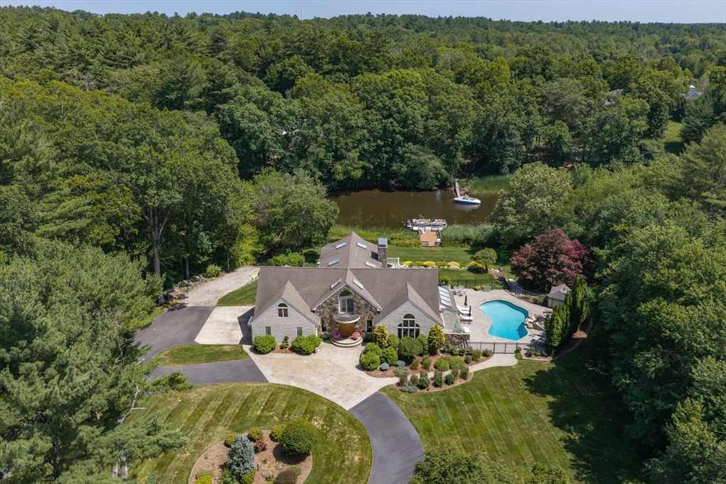 112 River Road Hanover, MA 02339 - Photo 1 of 42 an aerial view of a house with yard swimming pool and outdoor seating