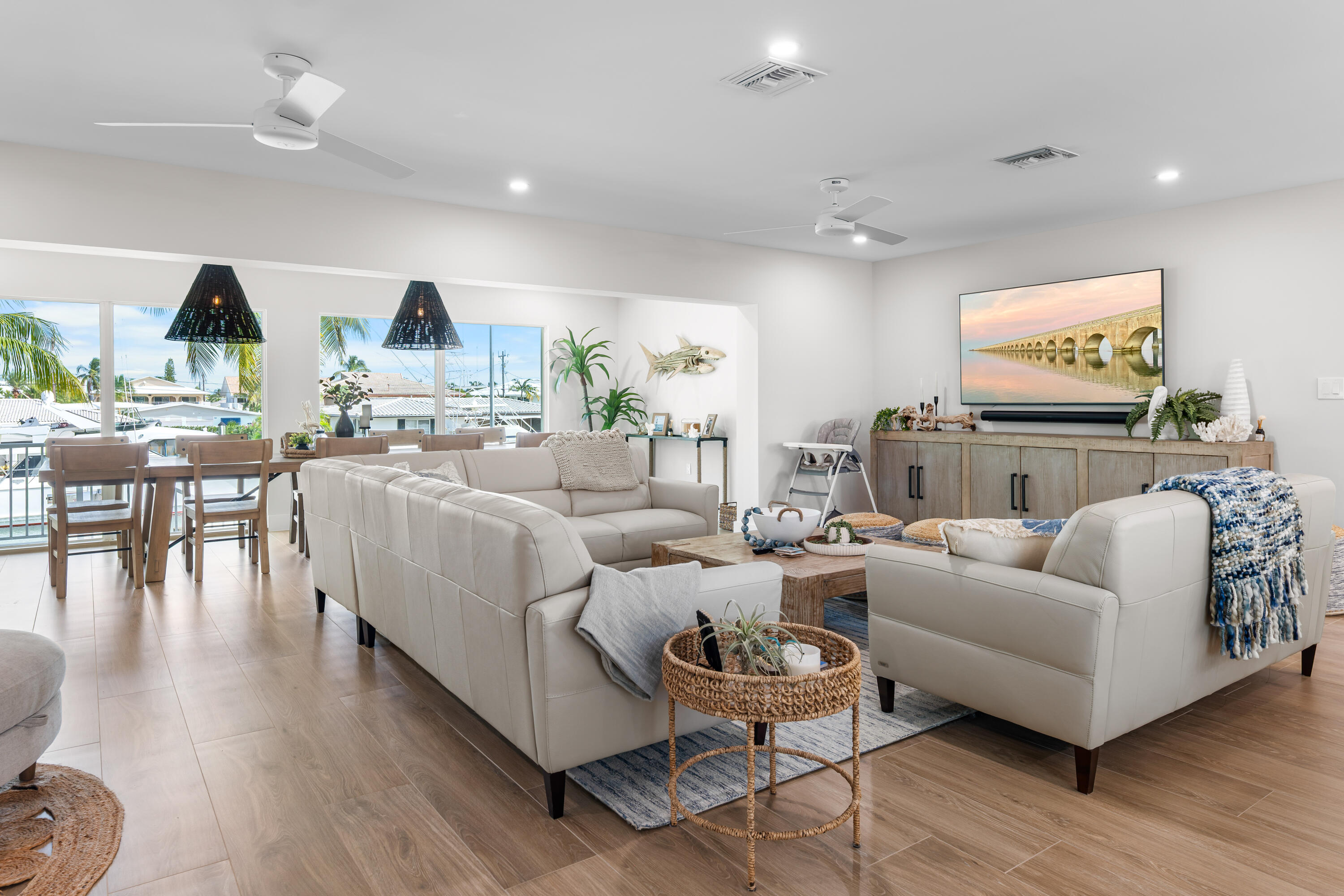 360 12th Street Key Colony Beach, FL 33051 - Photo 17 of 60 a living room with fireplace furniture and a flat screen tv