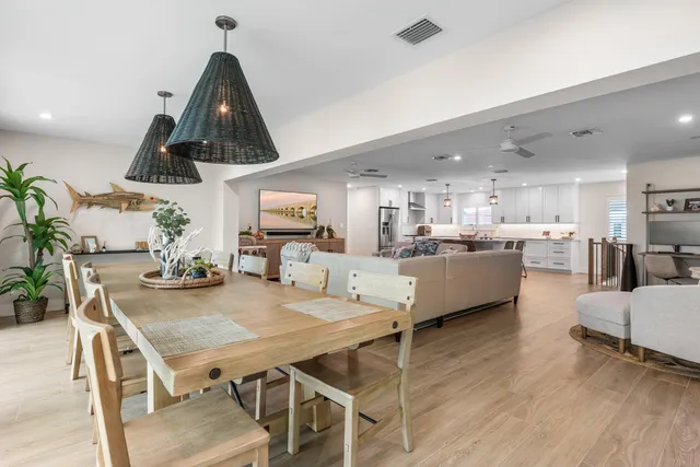 a bathroom with a toilet a sink and a mirror