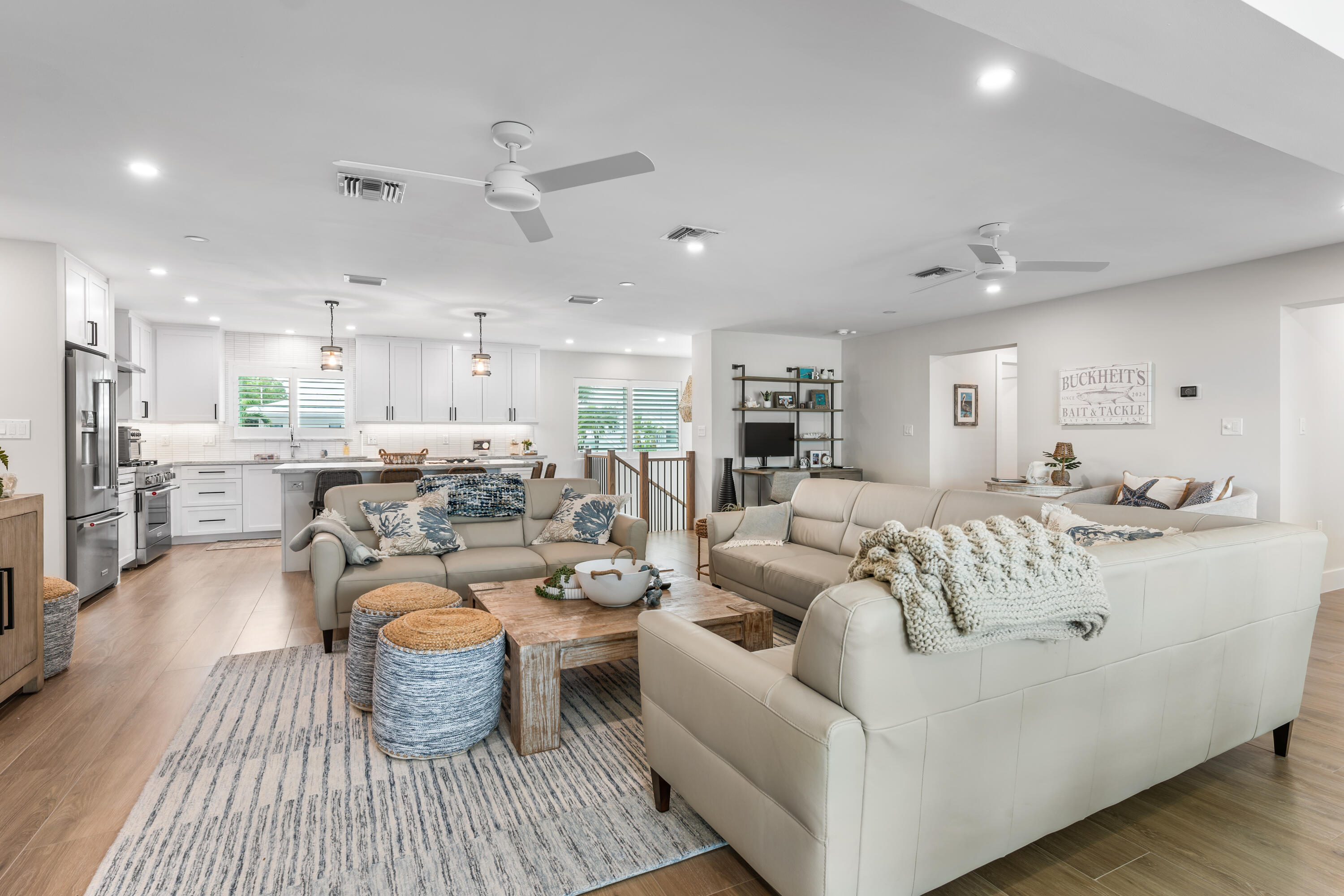 360 12th Street Key Colony Beach, FL 33051 - Photo 21 of 60 a living room with lots of furniture and a view of kitchen