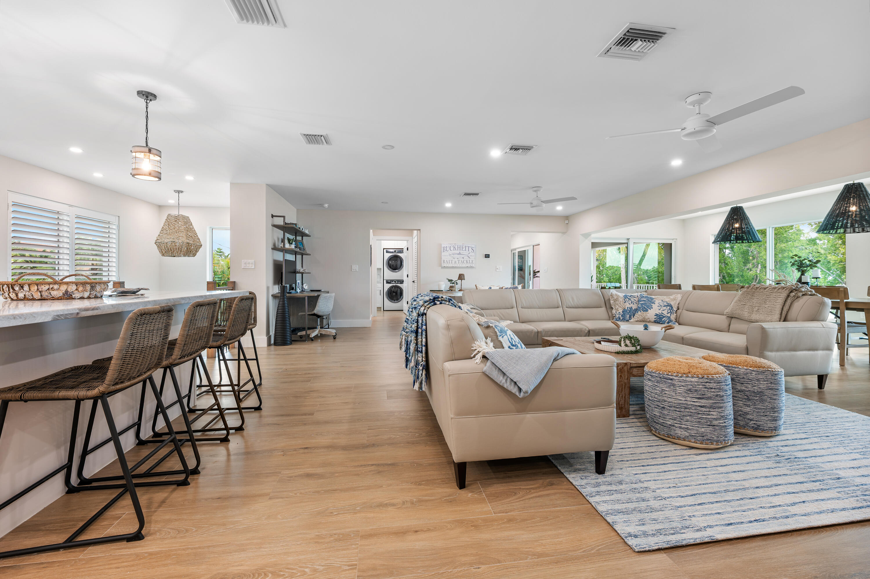 360 12th Street Key Colony Beach, FL 33051 - Photo 23 of 60 a living room with lots of furniture and kitchen view