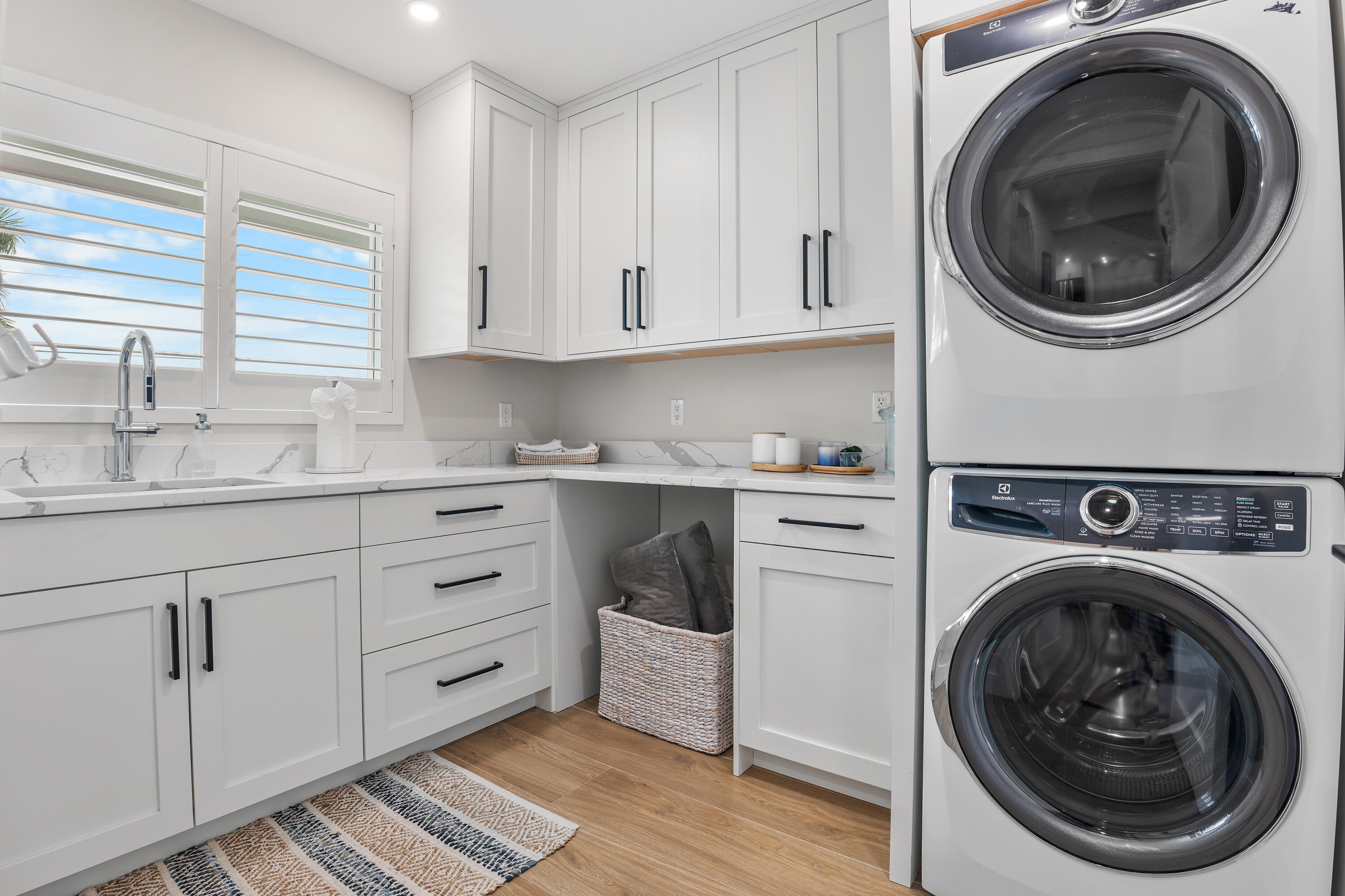 360 12th Street Key Colony Beach, FL 33051 - Photo 25 of 60 a utility room with sink dryer and washer