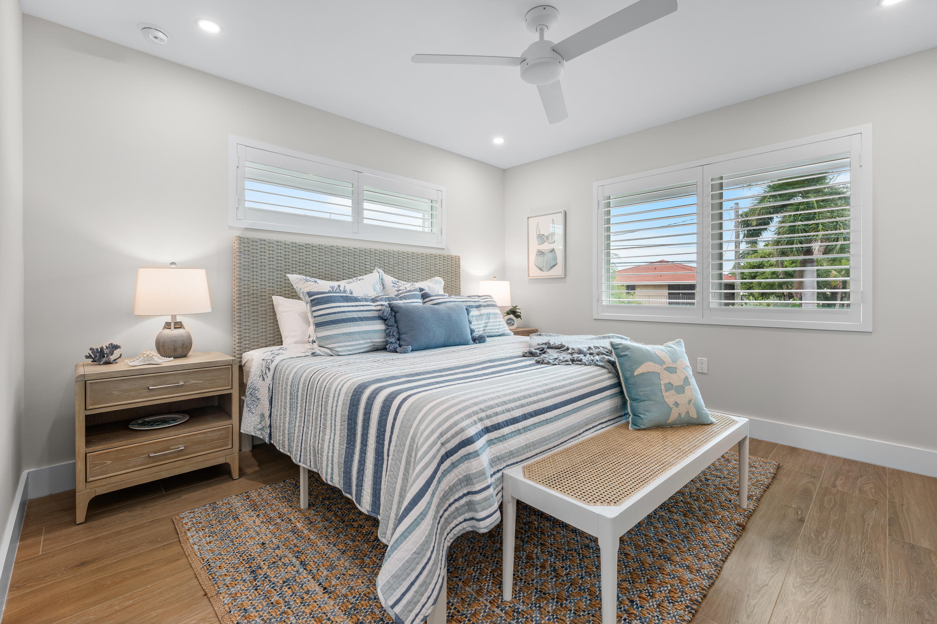 360 12th Street Key Colony Beach, FL 33051 - Photo 27 of 60 a bedroom with a bed and a window
