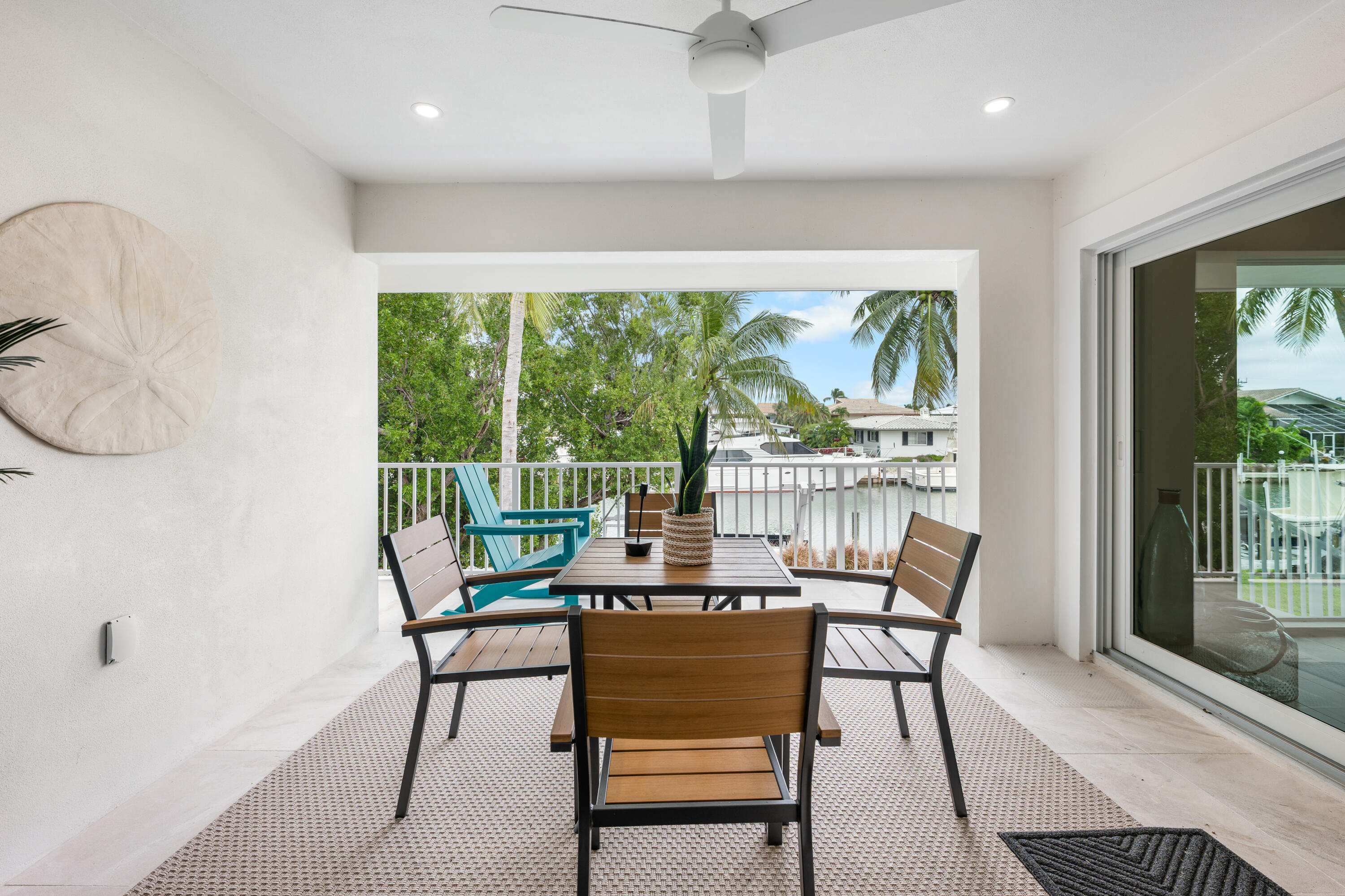 360 12th Street Key Colony Beach, FL 33051 - Photo 37 of 60 a view of a dining room with furniture window and outside view