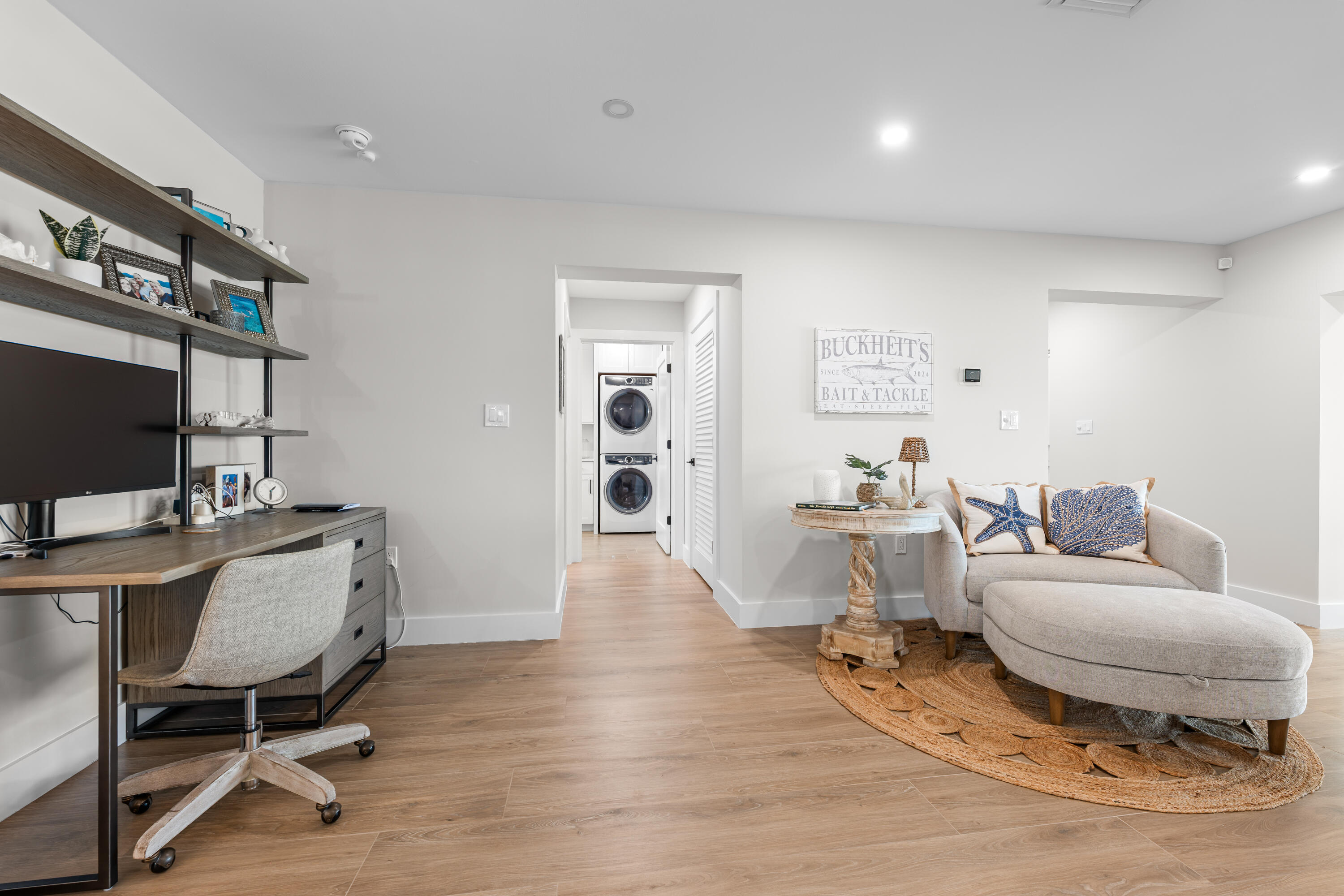 360 12th Street Key Colony Beach, FL 33051 - Photo 45 of 60 a living room with furniture a flat screen tv and a table