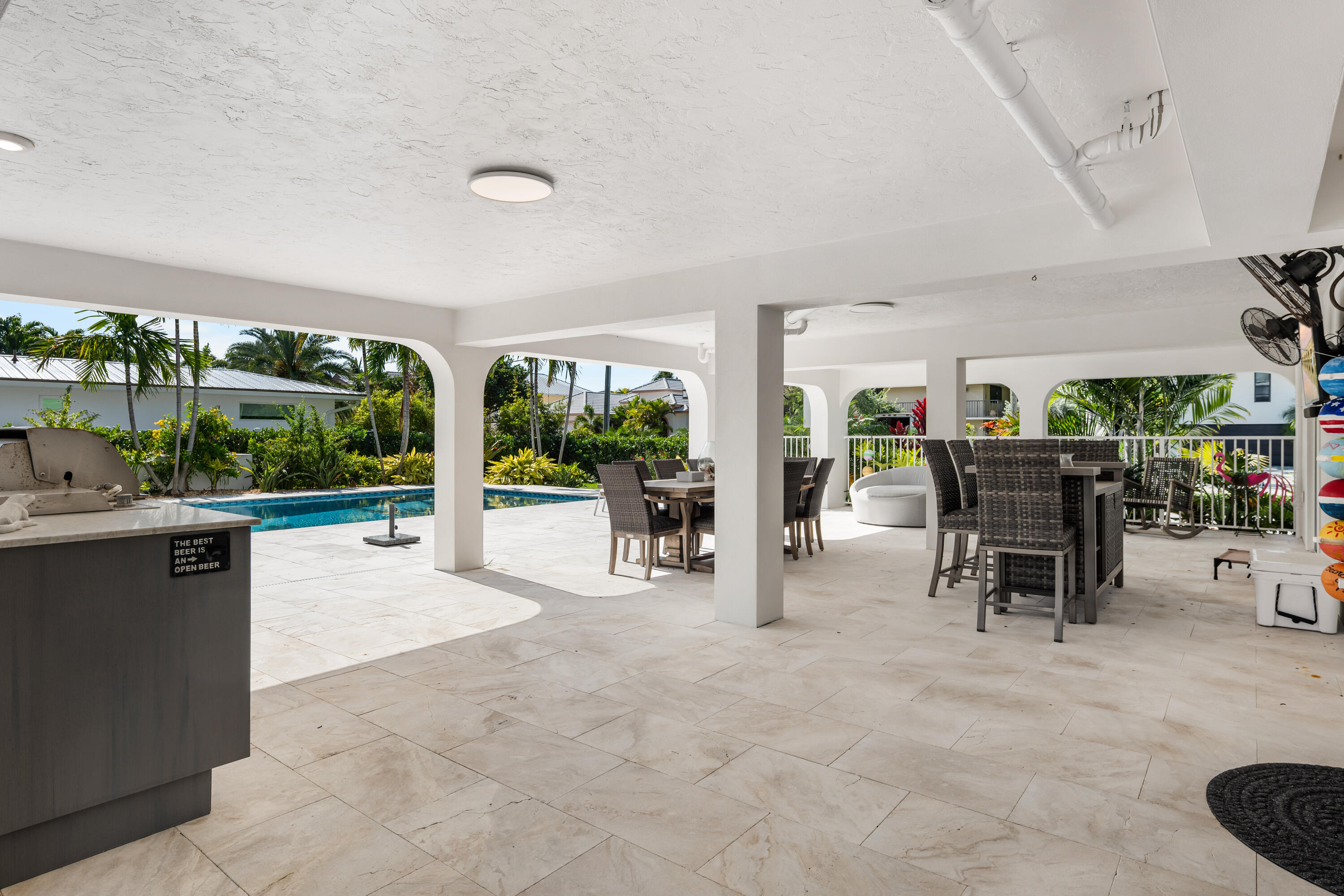 360 12th Street Key Colony Beach, FL 33051 - Photo 50 of 60 a room with lots of table and chairs