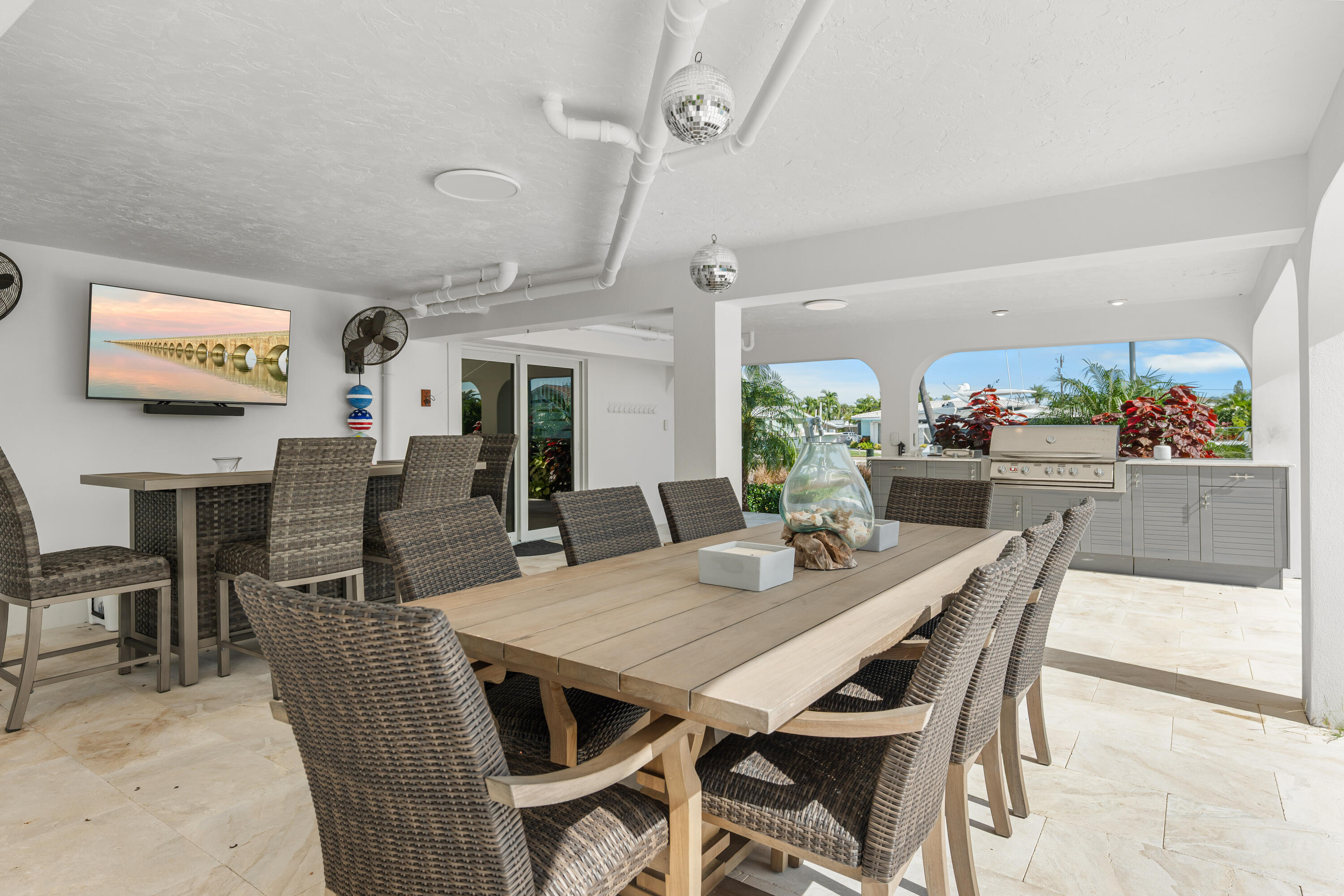 360 12th Street Key Colony Beach, FL 33051 - Photo 51 of 60 a view of a dining room with furniture