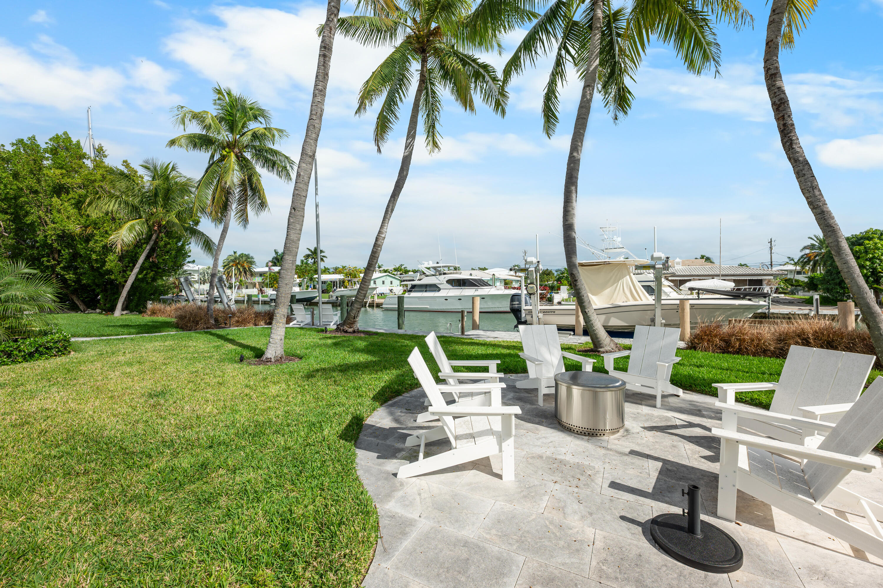 360 12th Street Key Colony Beach, FL 33051 - Photo 58 of 60 a view of a garden with sitting area