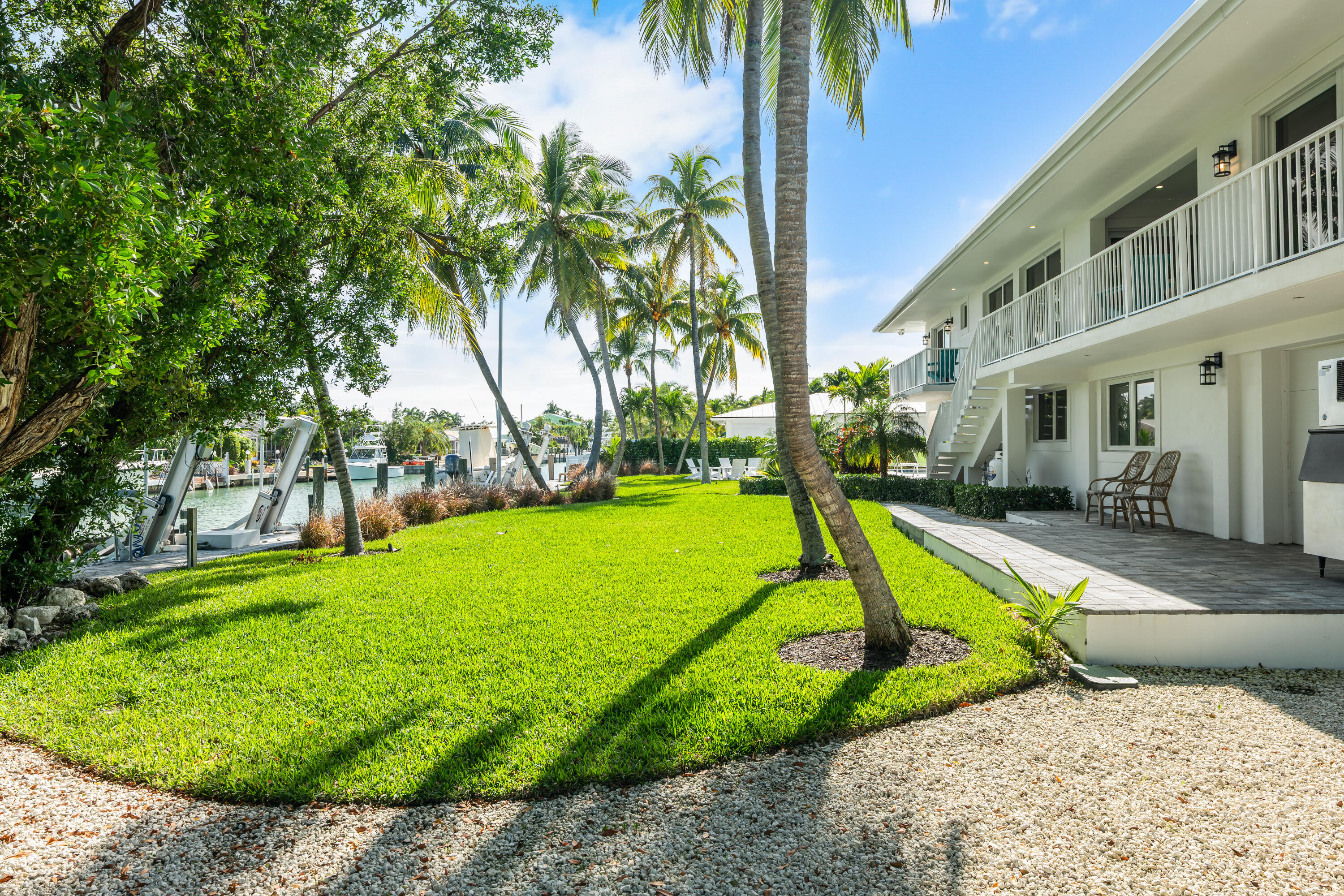360 12th Street Key Colony Beach, FL 33051 - Photo 59 of 60 a view of a park with plants and palm trees
