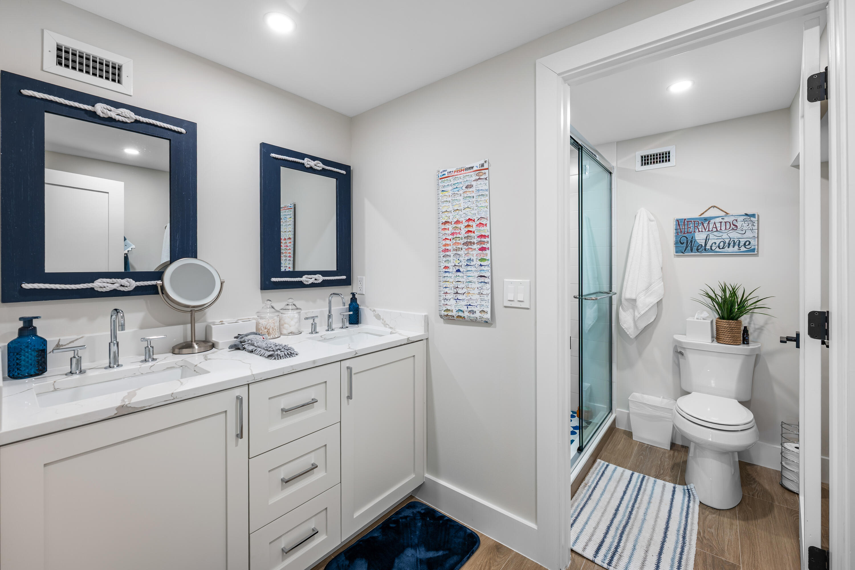 360 12th Street Key Colony Beach, FL 33051 - Photo 9 of 60 a bathroom with a granite countertop sink toilet and shower
